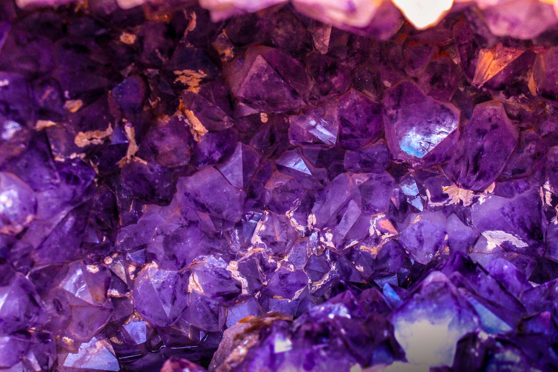 closeup photo of purple gemstones